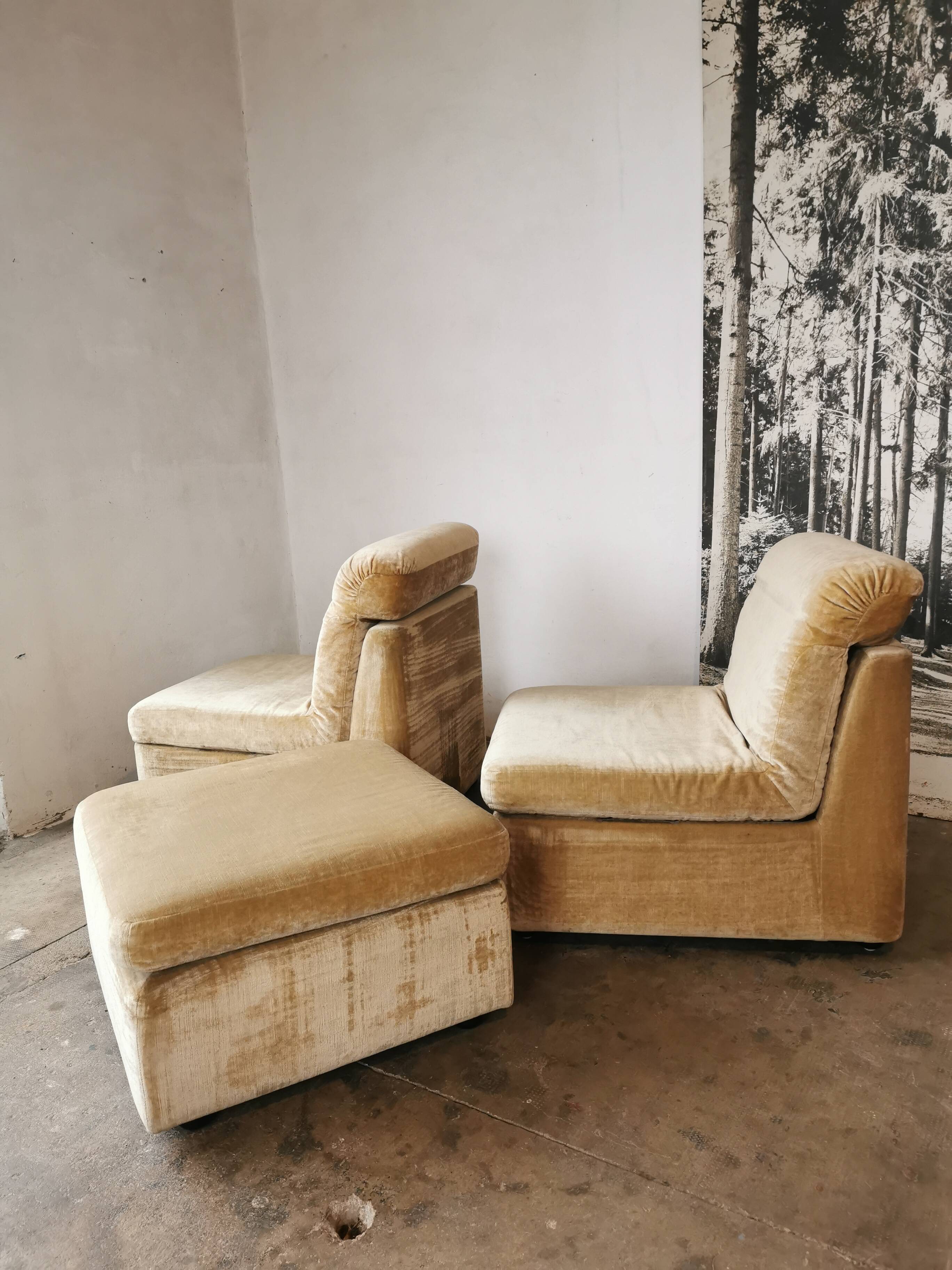 Pair of modular velvet armchairs and ottoman