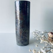 Vase tubulaire en céramique signé