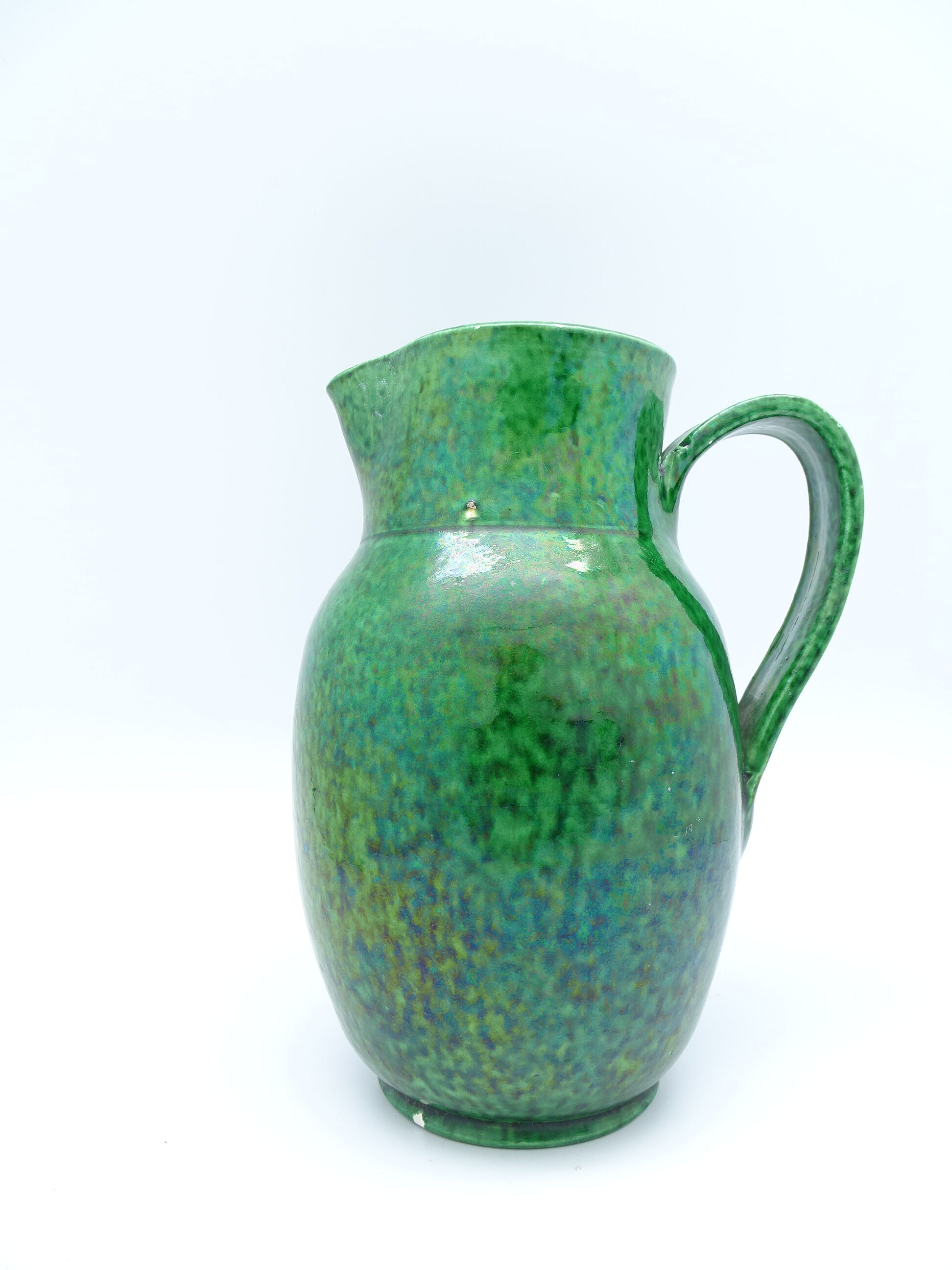 Green ceramic pitcher vase