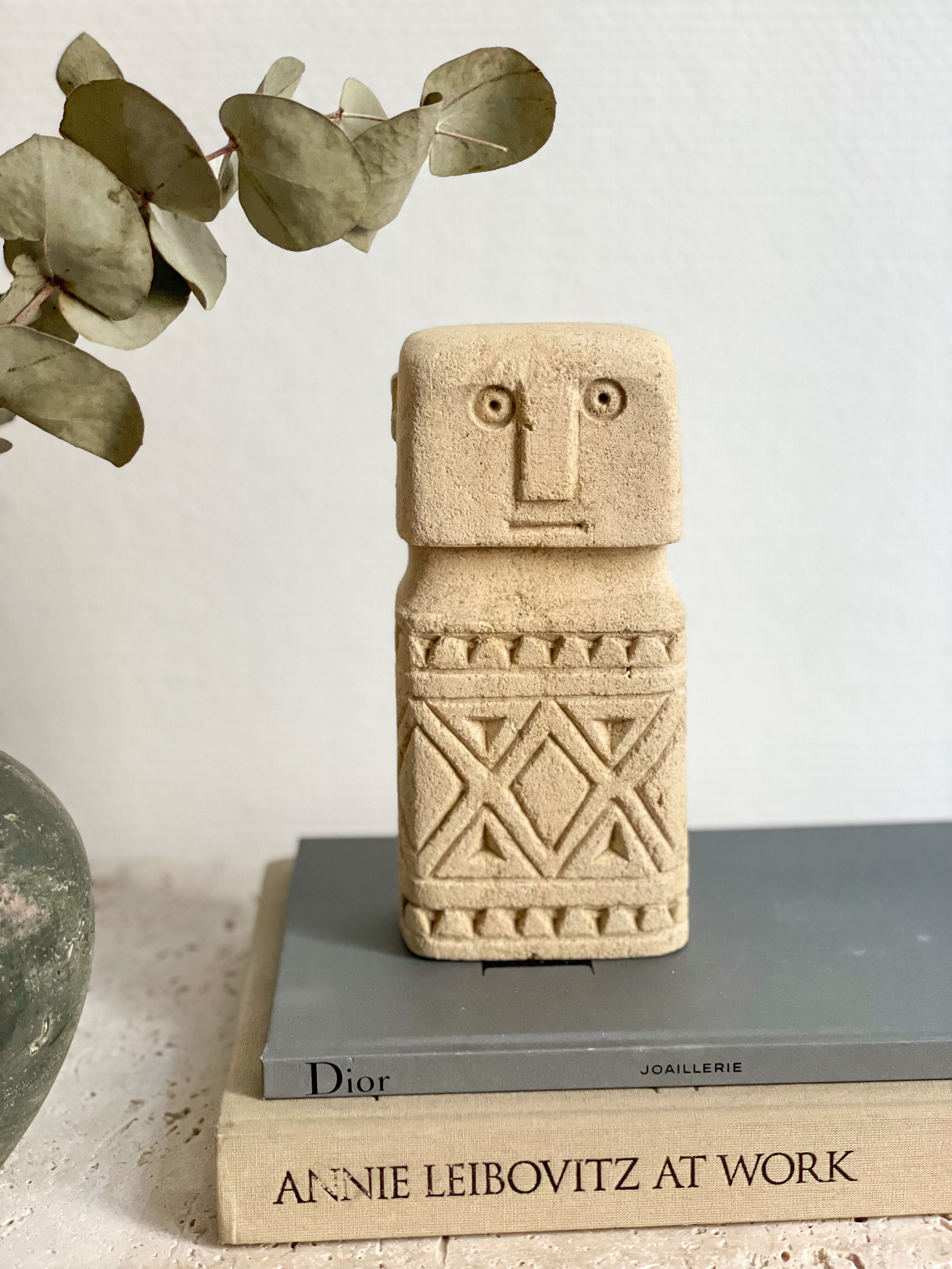 minimalist stone faces