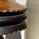 Foot of turned wooden lamp and carved