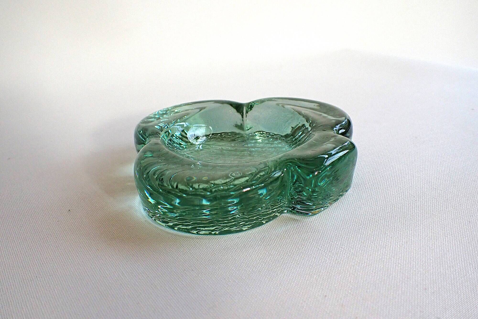 Vintage thick green glass aperitif bowl in the shape of a clover