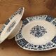Pair of plates on presentation legs, terre de Fer Gien
