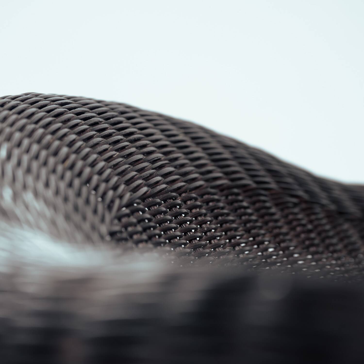 Sculptural rattan tripod armchairs in the manner of Boris Sipek