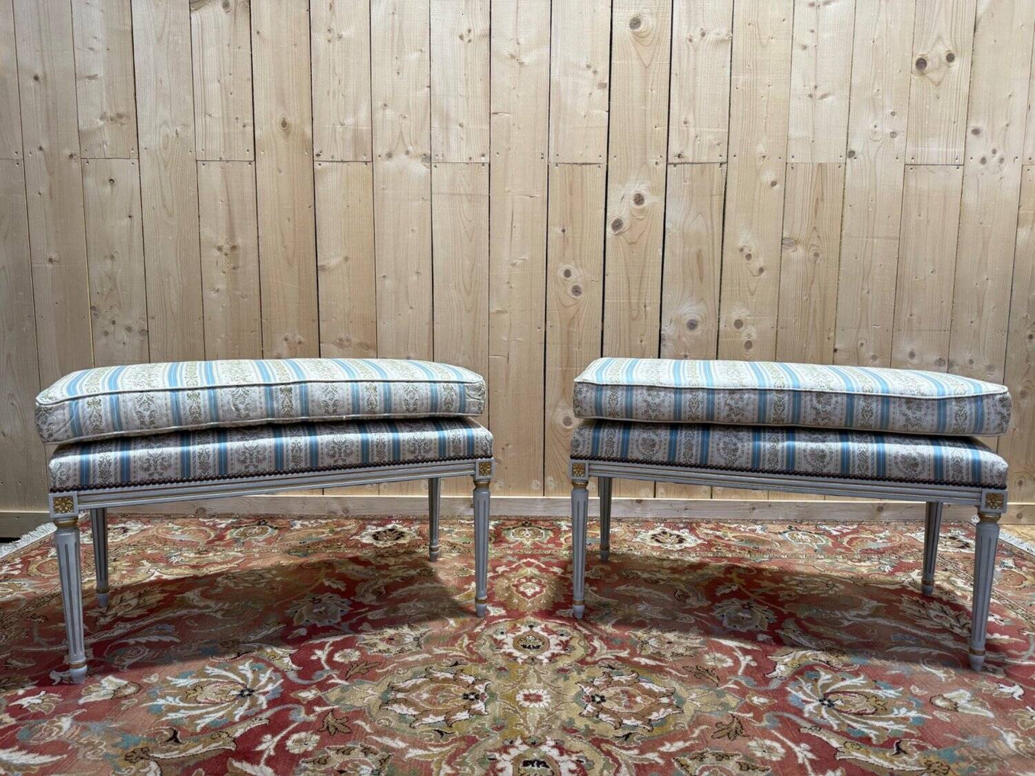 Pair of Louis XVI benches in lacquered and gilded wood
