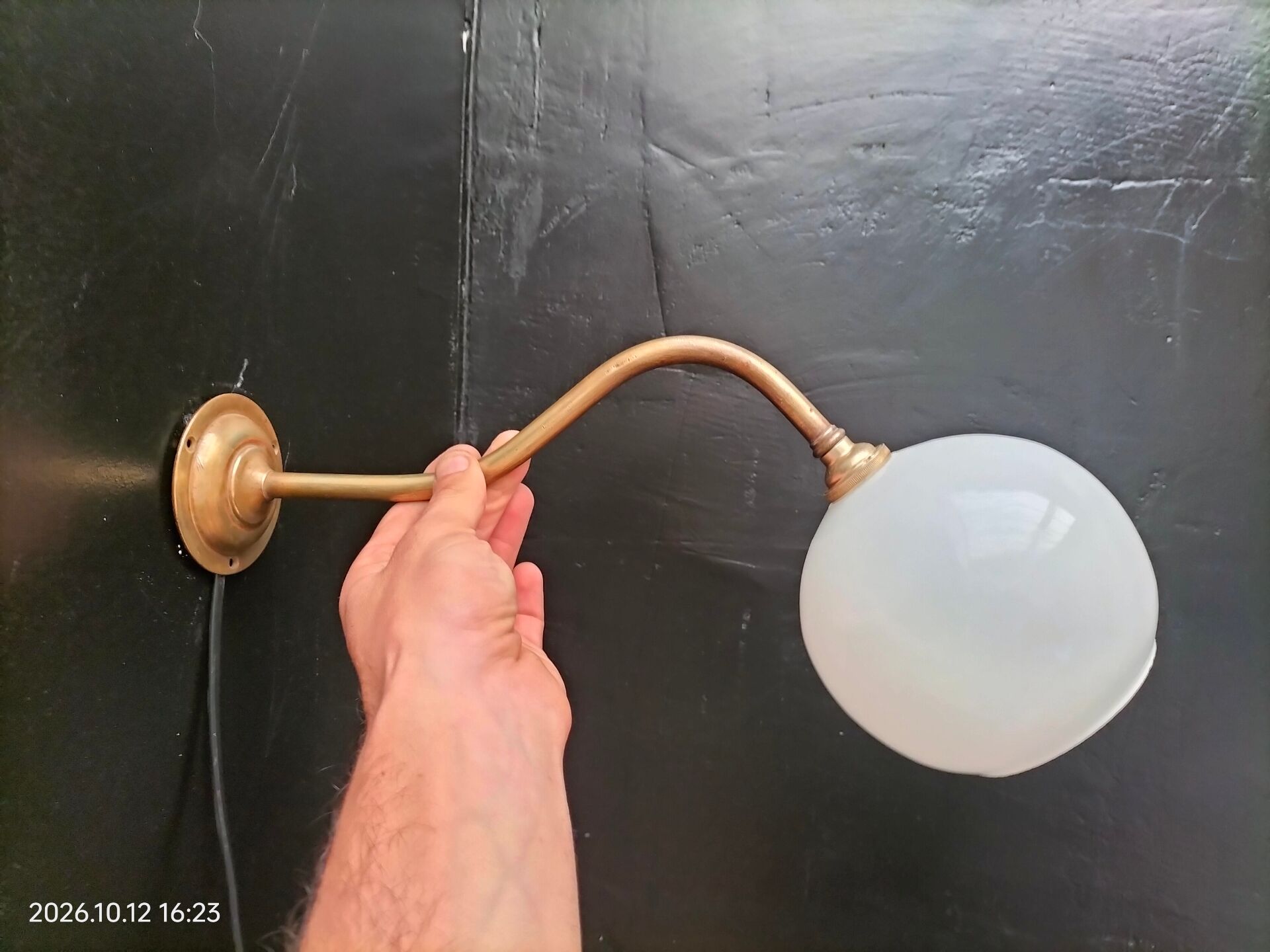Brass and glass wall light