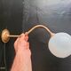 Brass and glass wall light