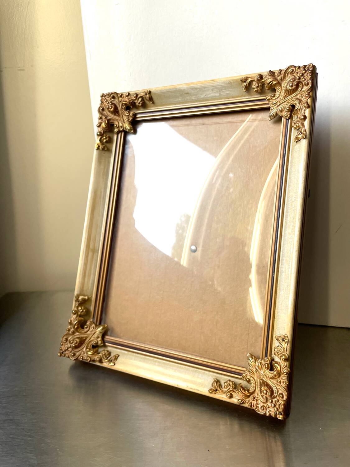 Antique wooden frame with metal gold colored details 28 cm x 22 cm convex glass