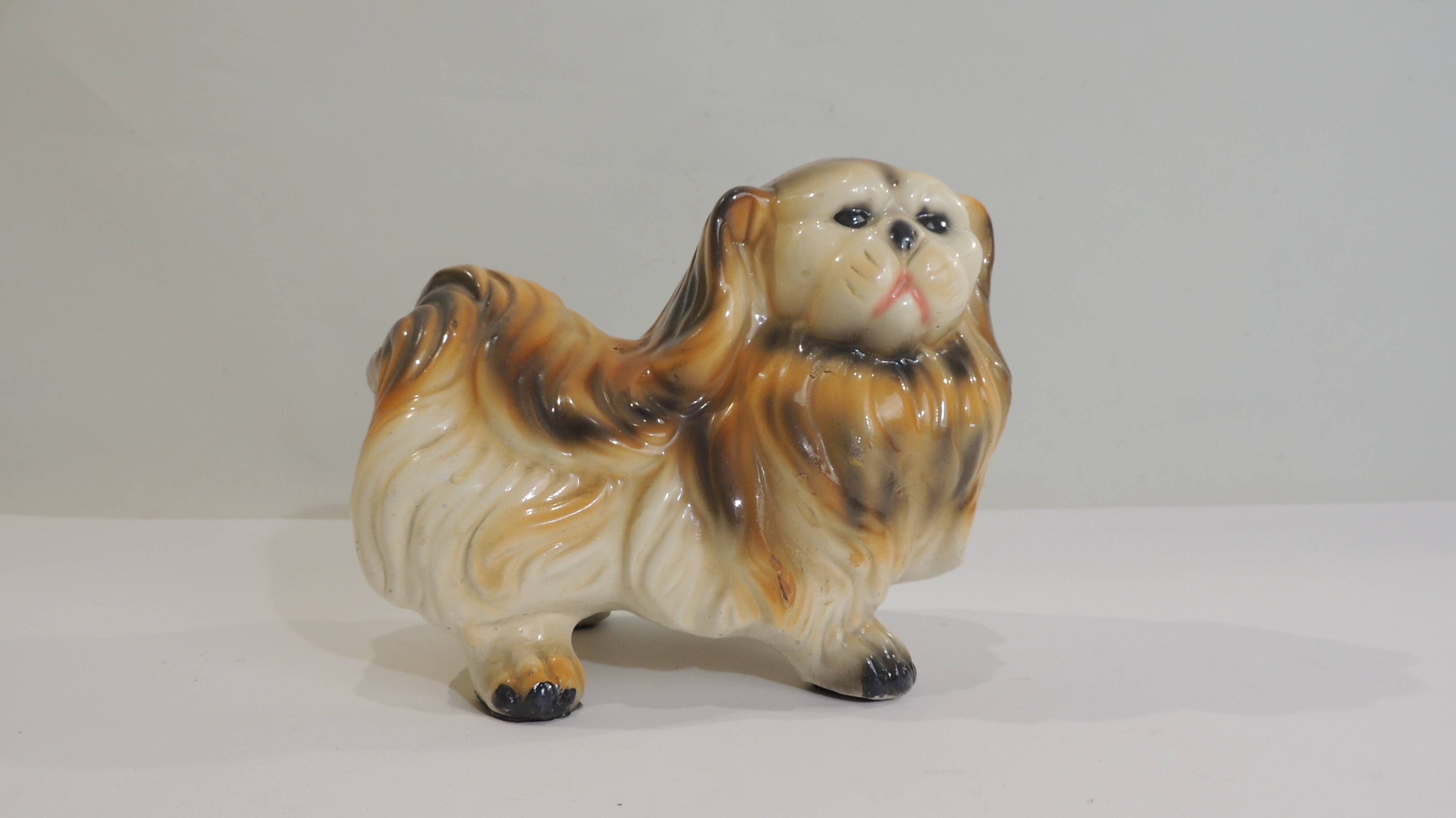 Vintage 1970s ceramic Pekingese dog, decorative figurine, statue.