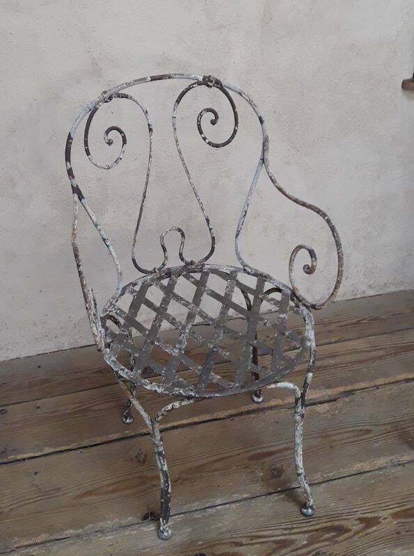 19th-century garden armchair in wrought iron