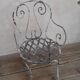 19th-century garden armchair in wrought iron