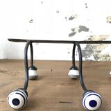 Porcelain and wrought iron