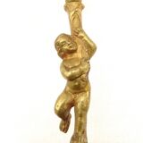 Lampe à poser cherubin en laiton.