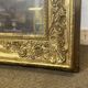 19th-century mirror in gilded wood and plaster.