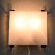 Mid-century modern sconces of black iron sheets and white lucite spain 1960s