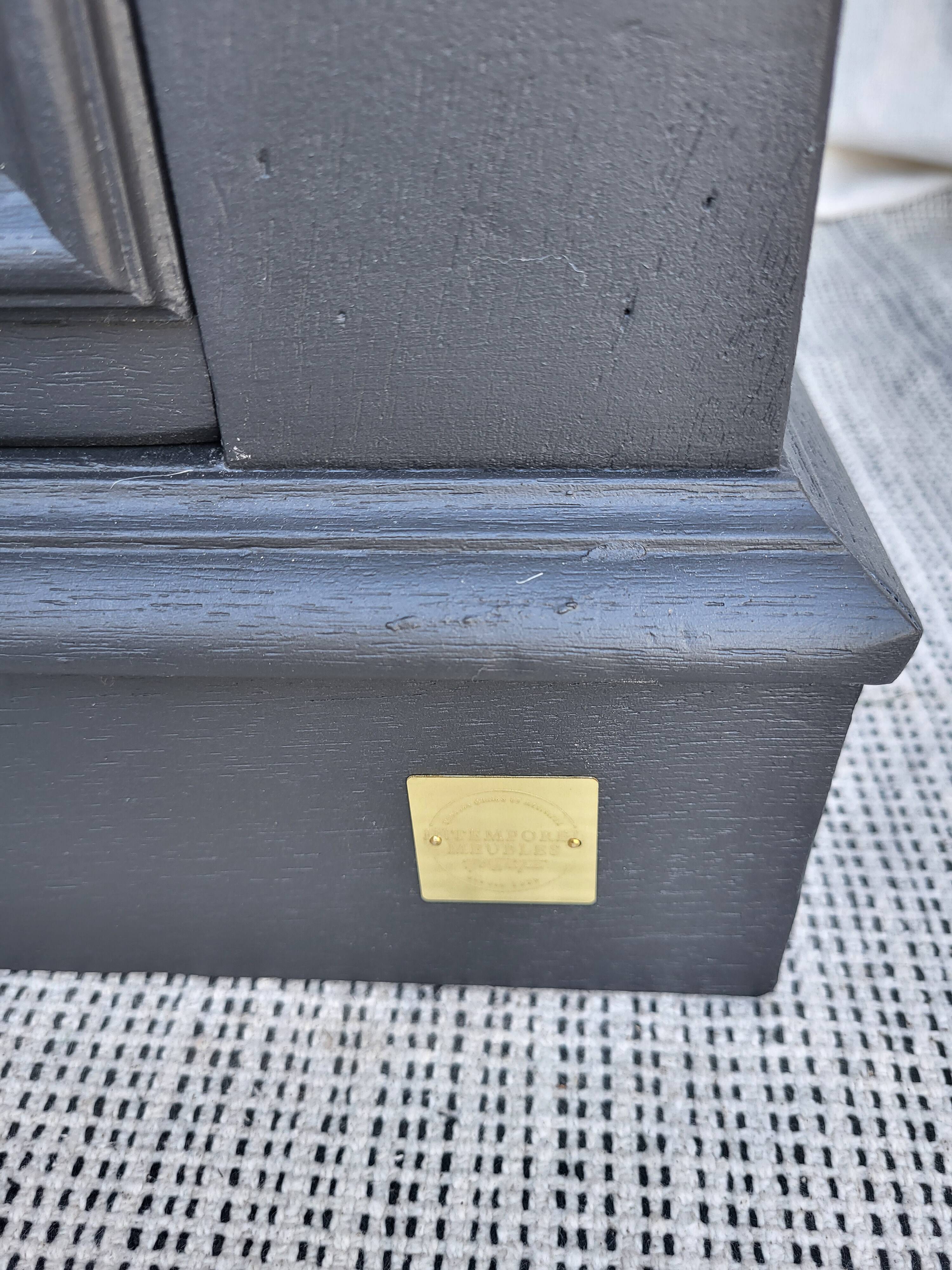 Black and raw wood dresser