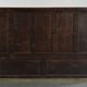 Antique English oak hall bench from the early 19th century with storage space