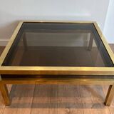 Coffee table in brass and black lacquer by Guy Lefèvre for Maison Jansen