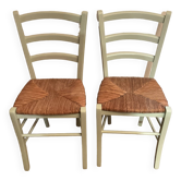Pair of green straw chairs