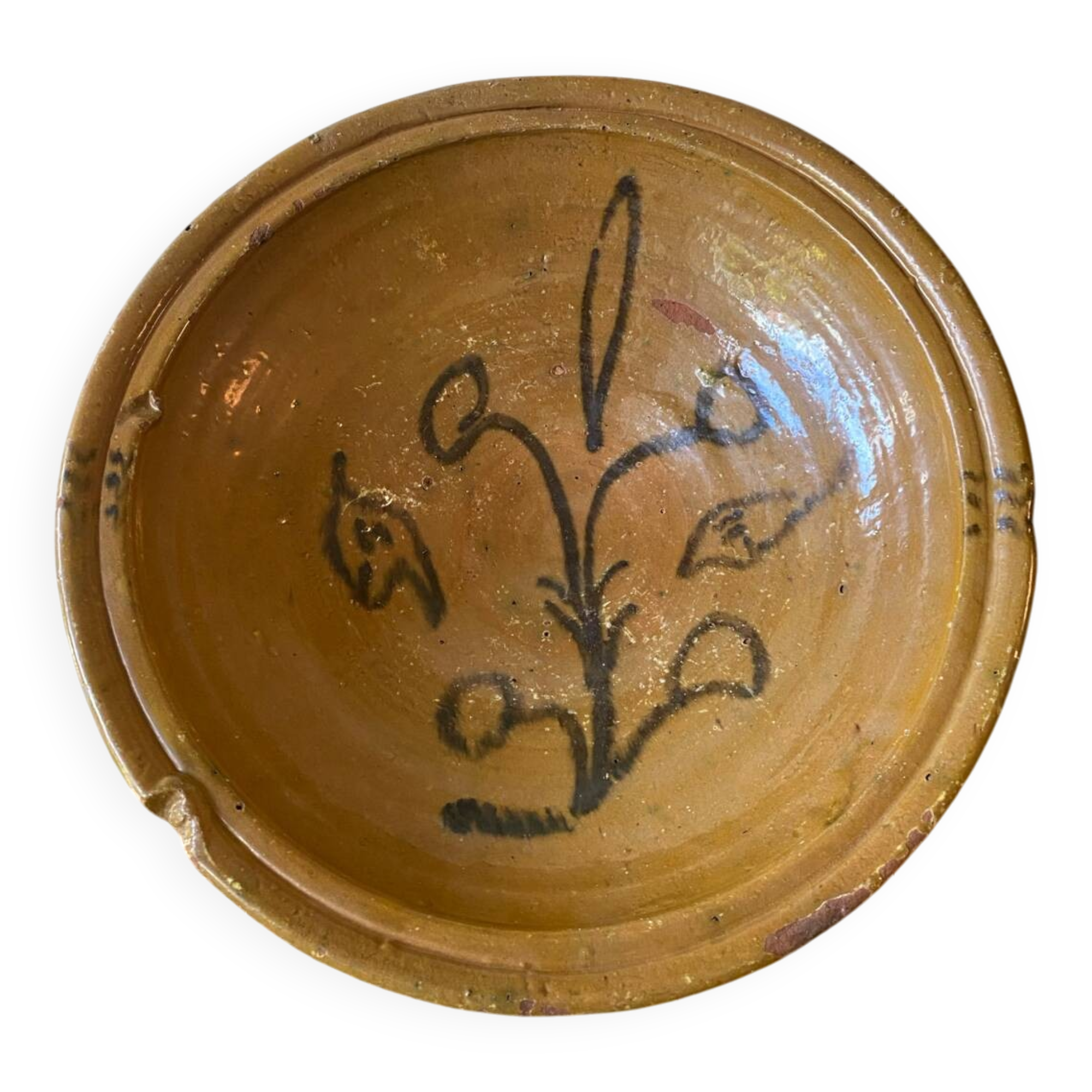 Old glazed terracotta dish