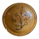 Old glazed terracotta dish