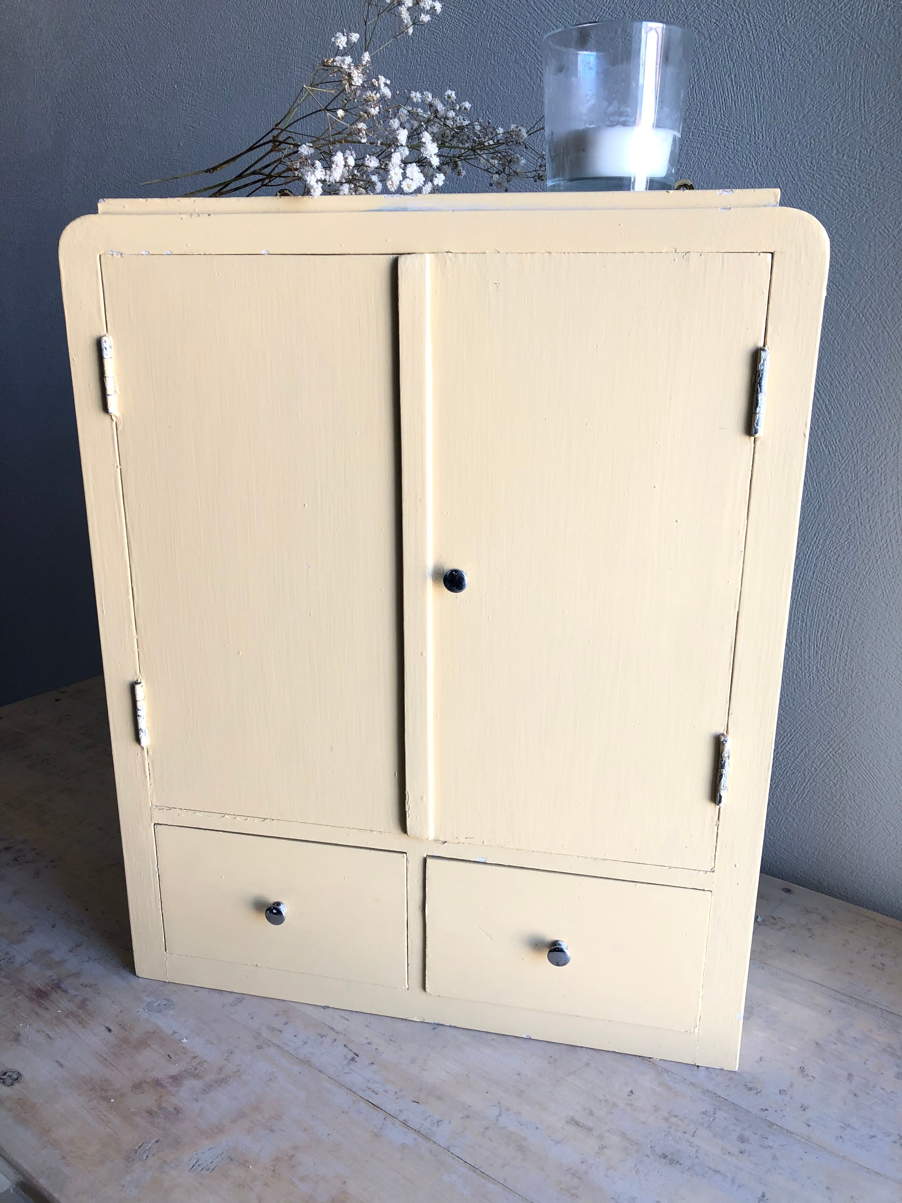 Weathered toilet cabinet