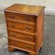 2 English wooden chests of drawers with 4 drawers