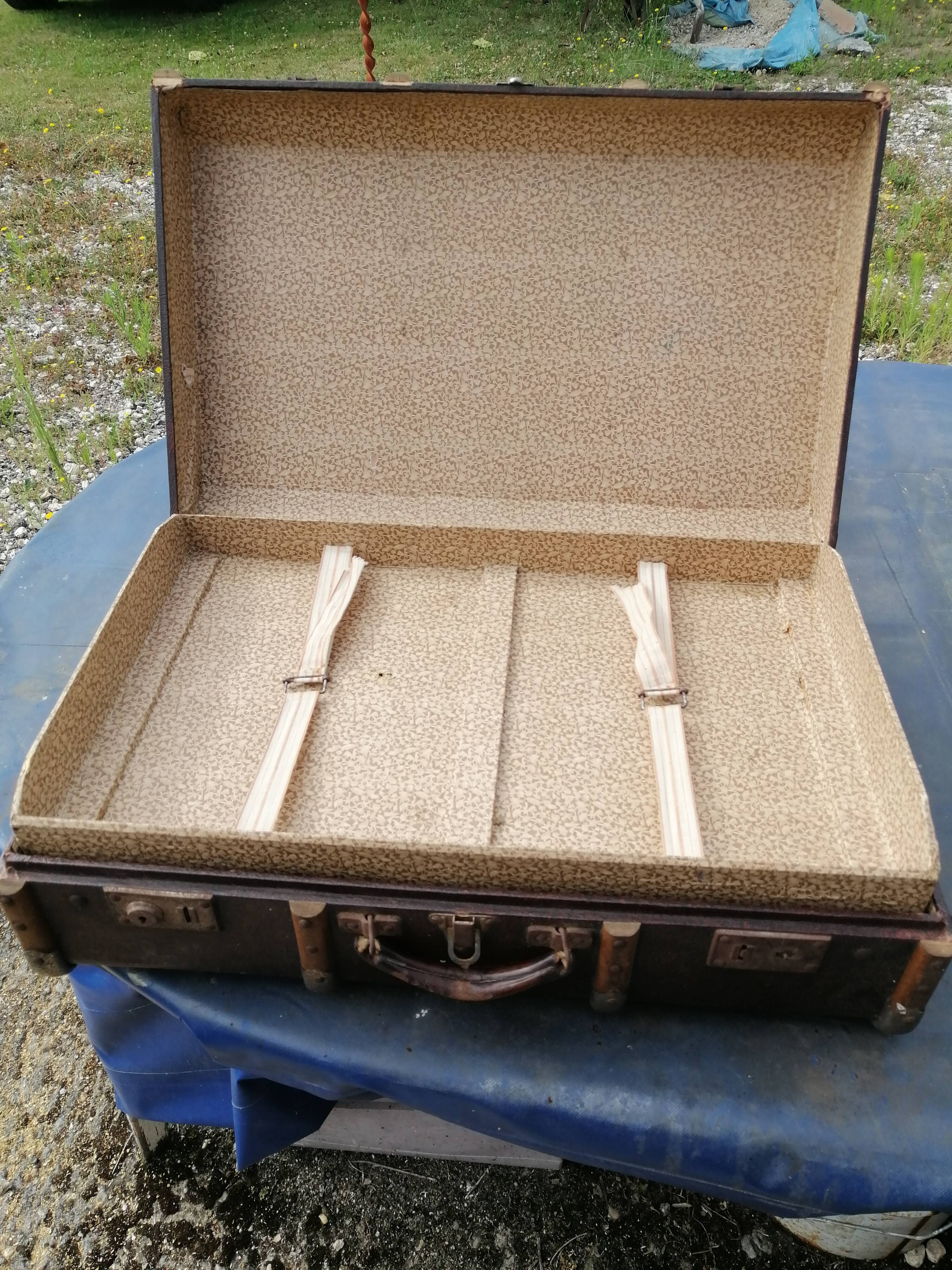 Antique suitcase in leather wood and vintage metal