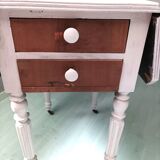 Table with drop-leaf parts