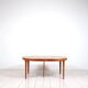 Round dining table in teak by Ib Kofod Larsen for Faarup Mobelfabrik