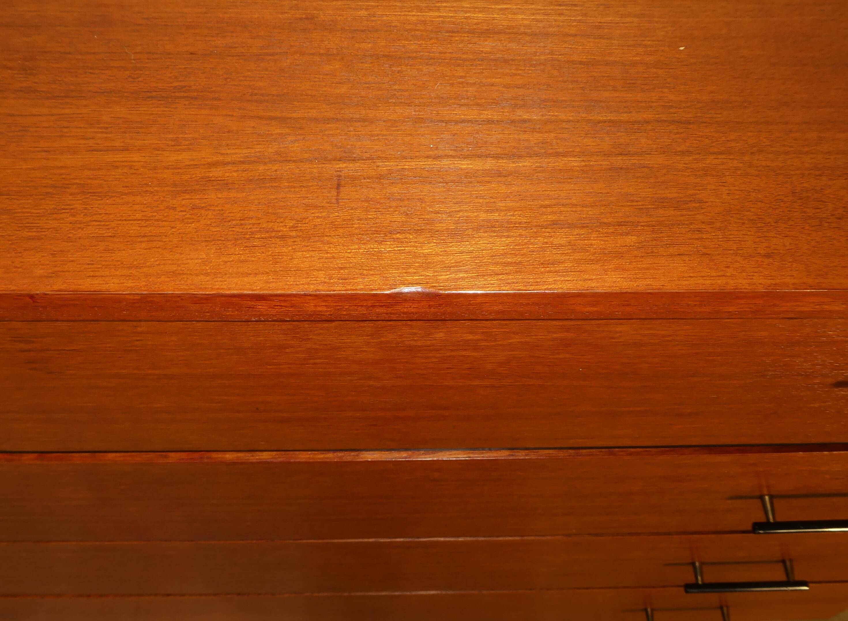 Vintage 1950s teak chest of drawers in metal