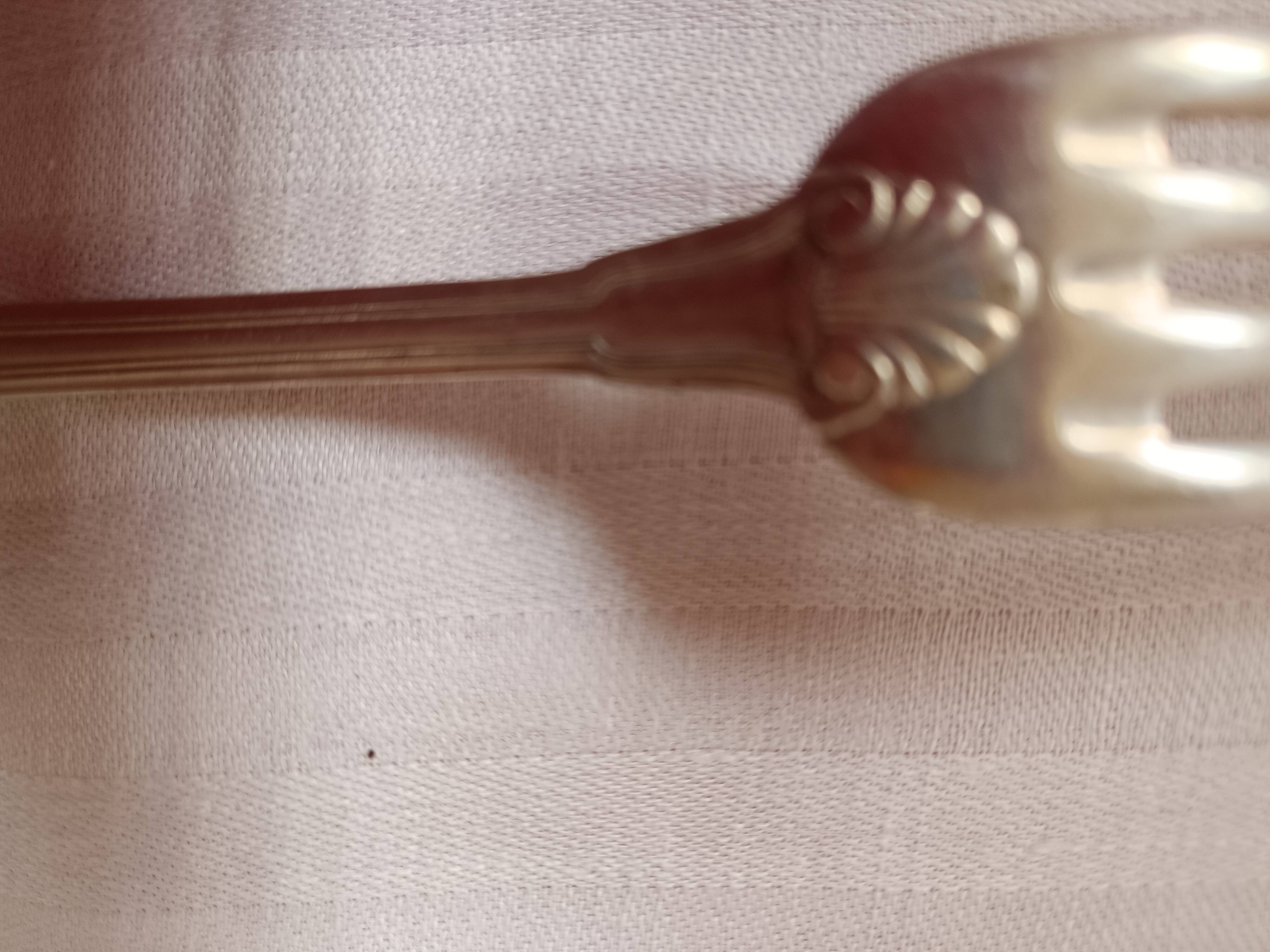 12 silver-plated forks. shell and pearls.