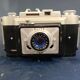 Fex Elite camera with leather cover and flash