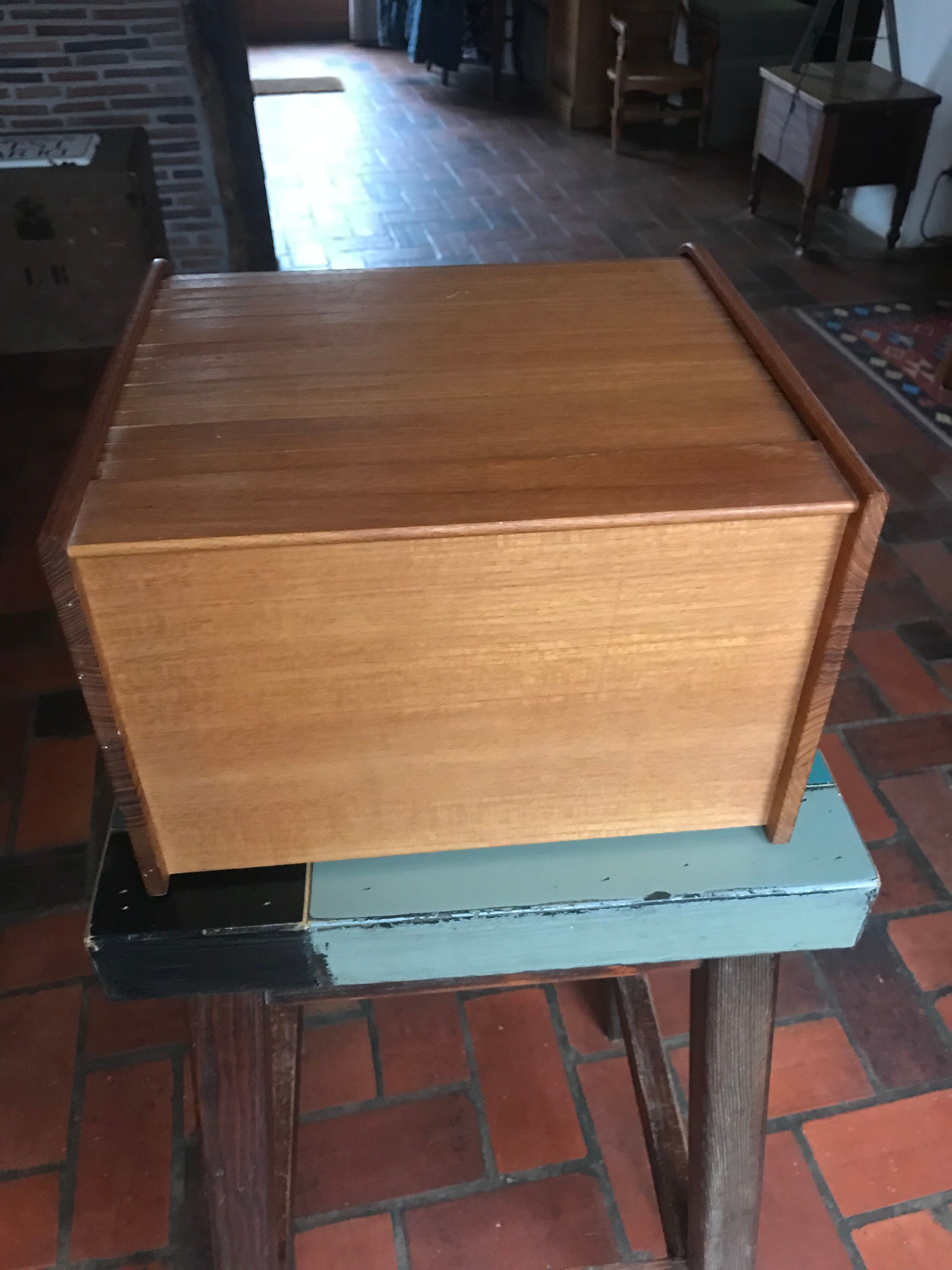 Teak box with curtain door