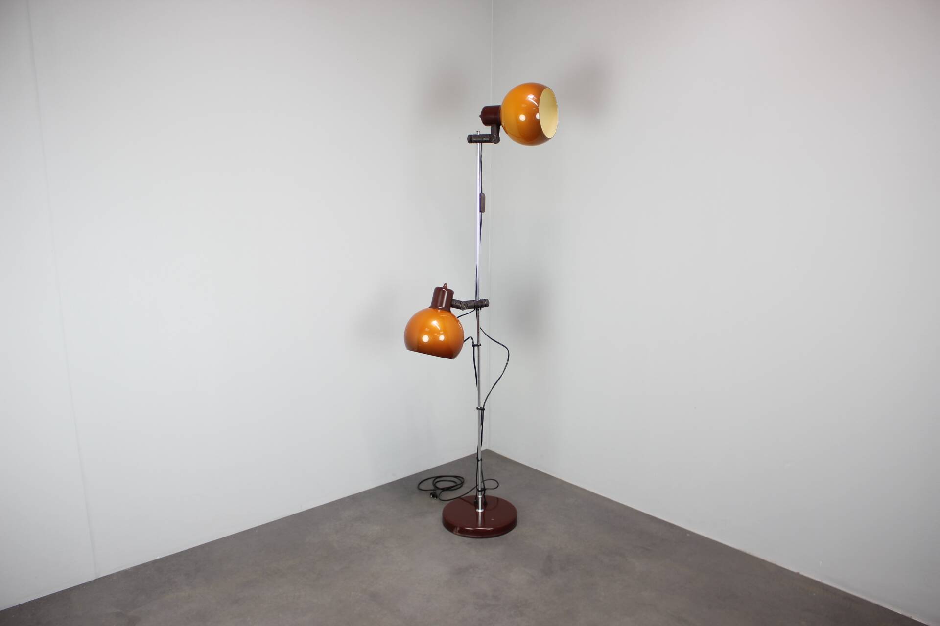 Vintage Hungarian adjustable floor lamp with two orange globe shades, circa 1970.