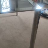 Dining table in chromed steel and smoked glass slab in 1969
