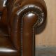 Restored Chesterfield leather sofa in vintage Art Deco style