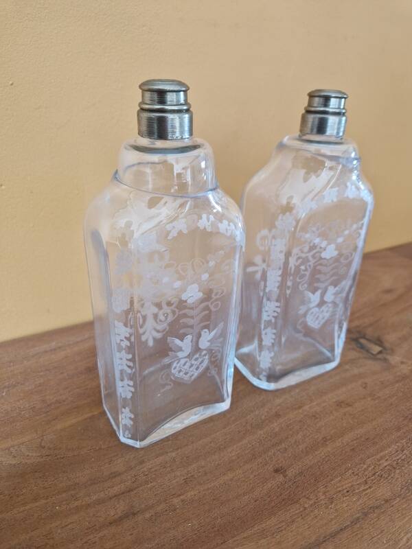Pair of old engraved and frosted glass bottle vases.