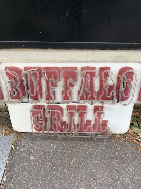 Buffalo Grill sign plate with neon