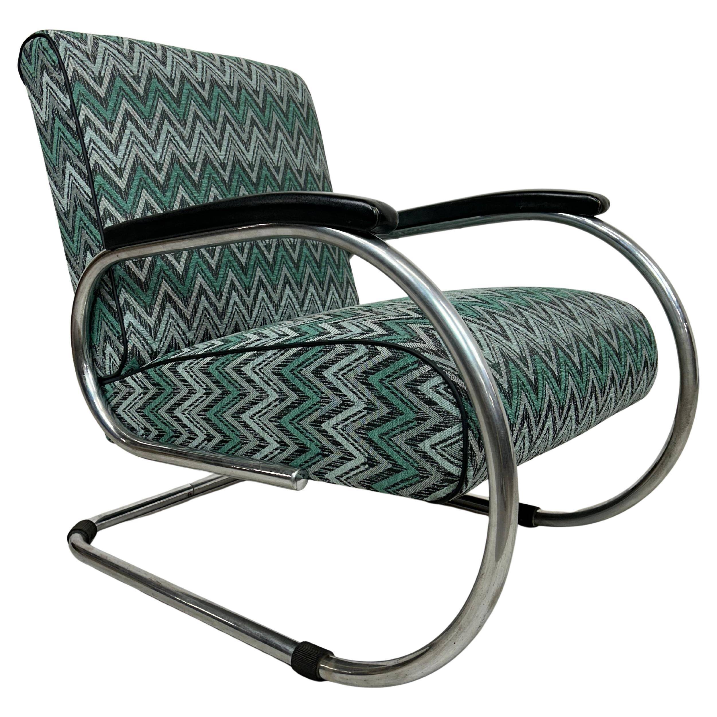 Tubular steel armchair by Tubax