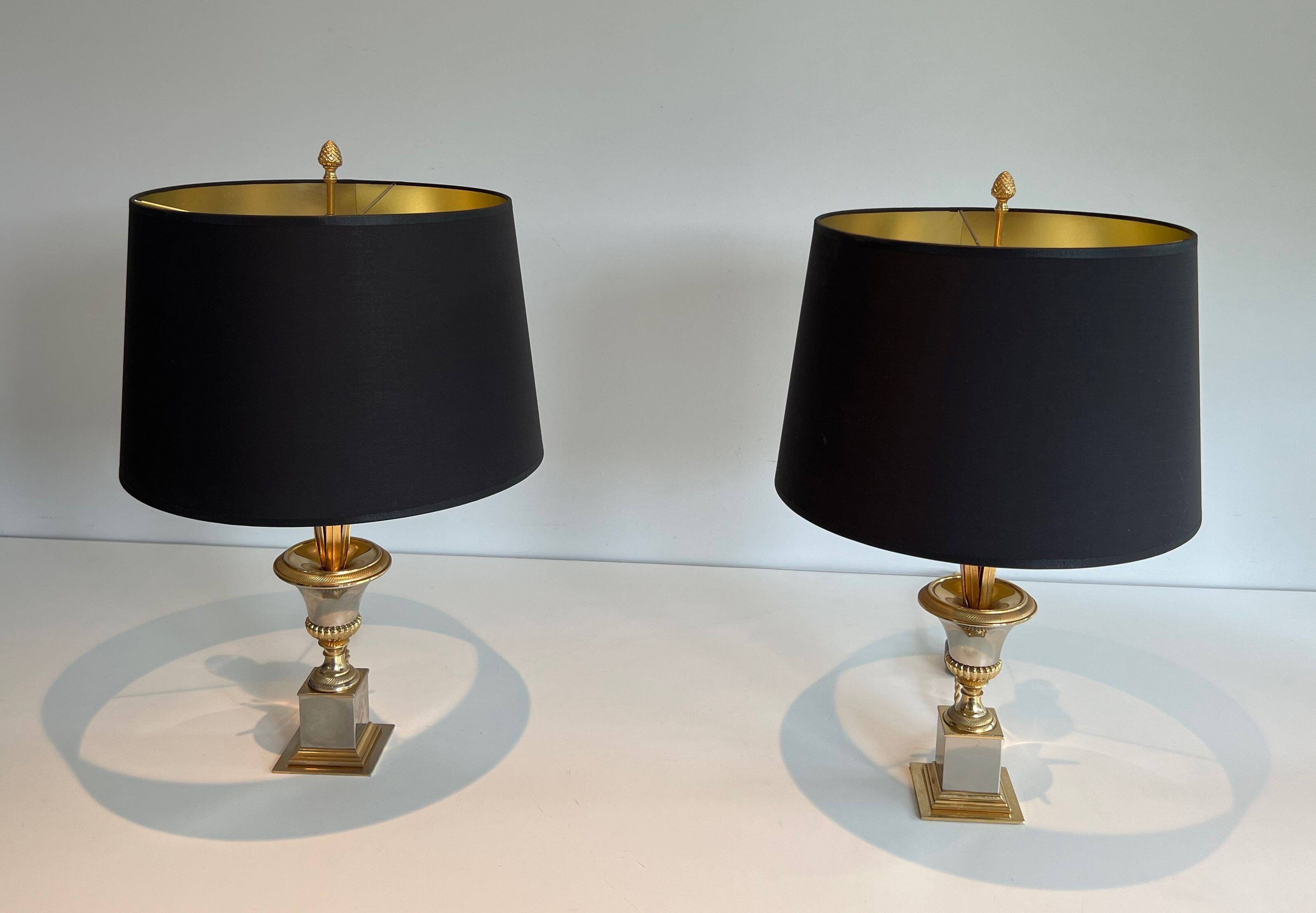 Pair of palm lamps in chrome and brass in the style of Maison Charles. Circa 1970.