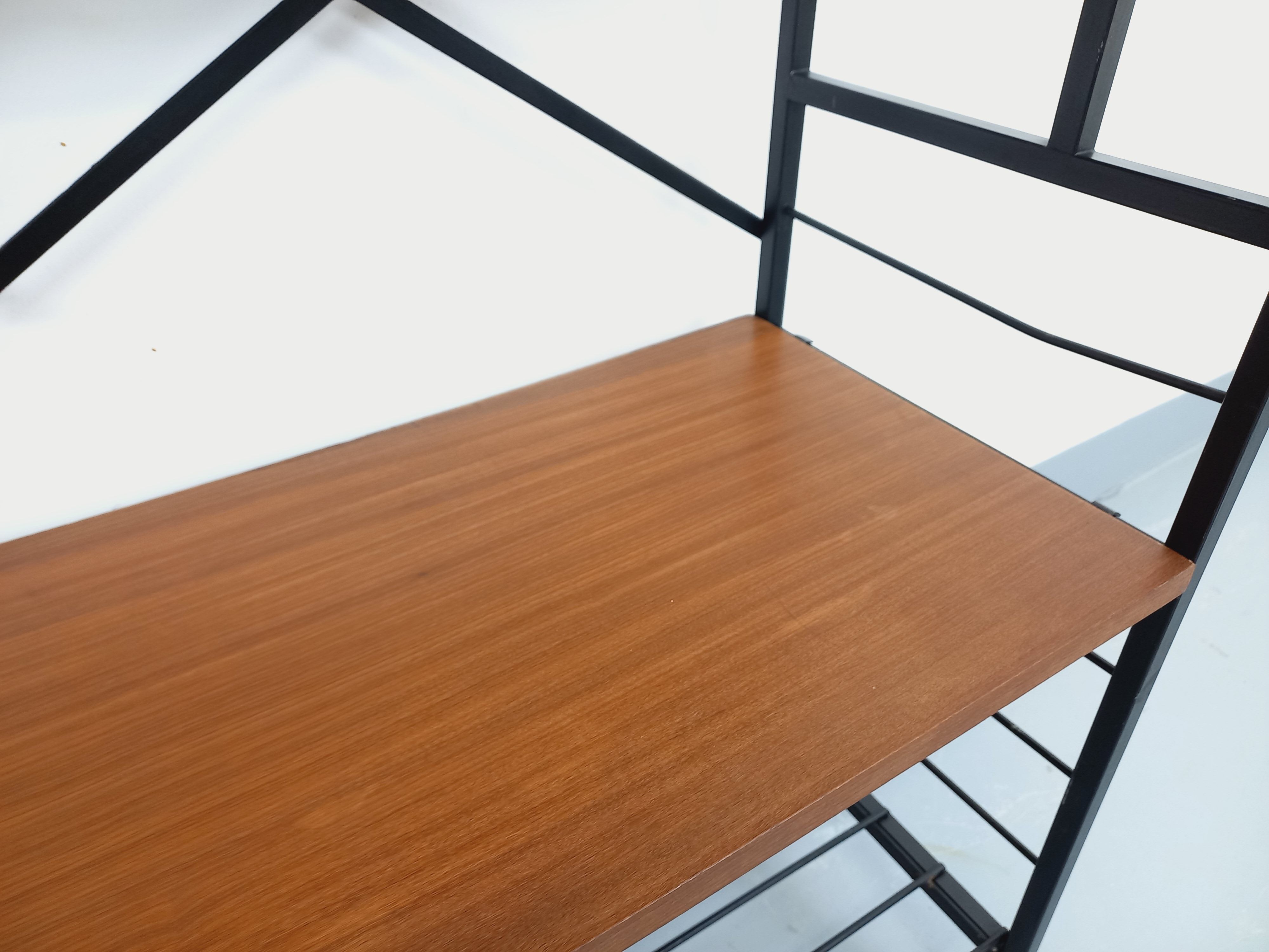 Vintage Italian bookshelf in teak and metal from the 1960s.