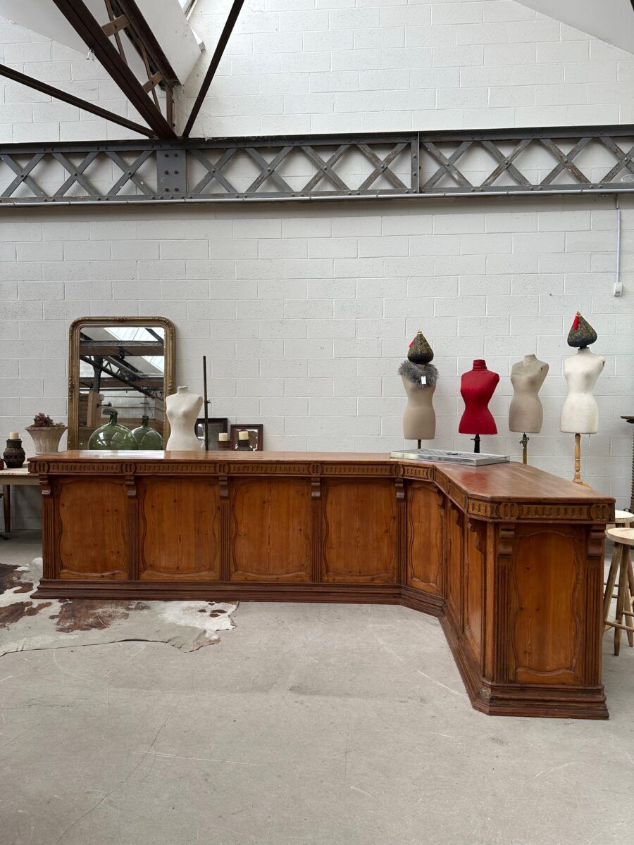 Large corner bar counter from the late 19th century.