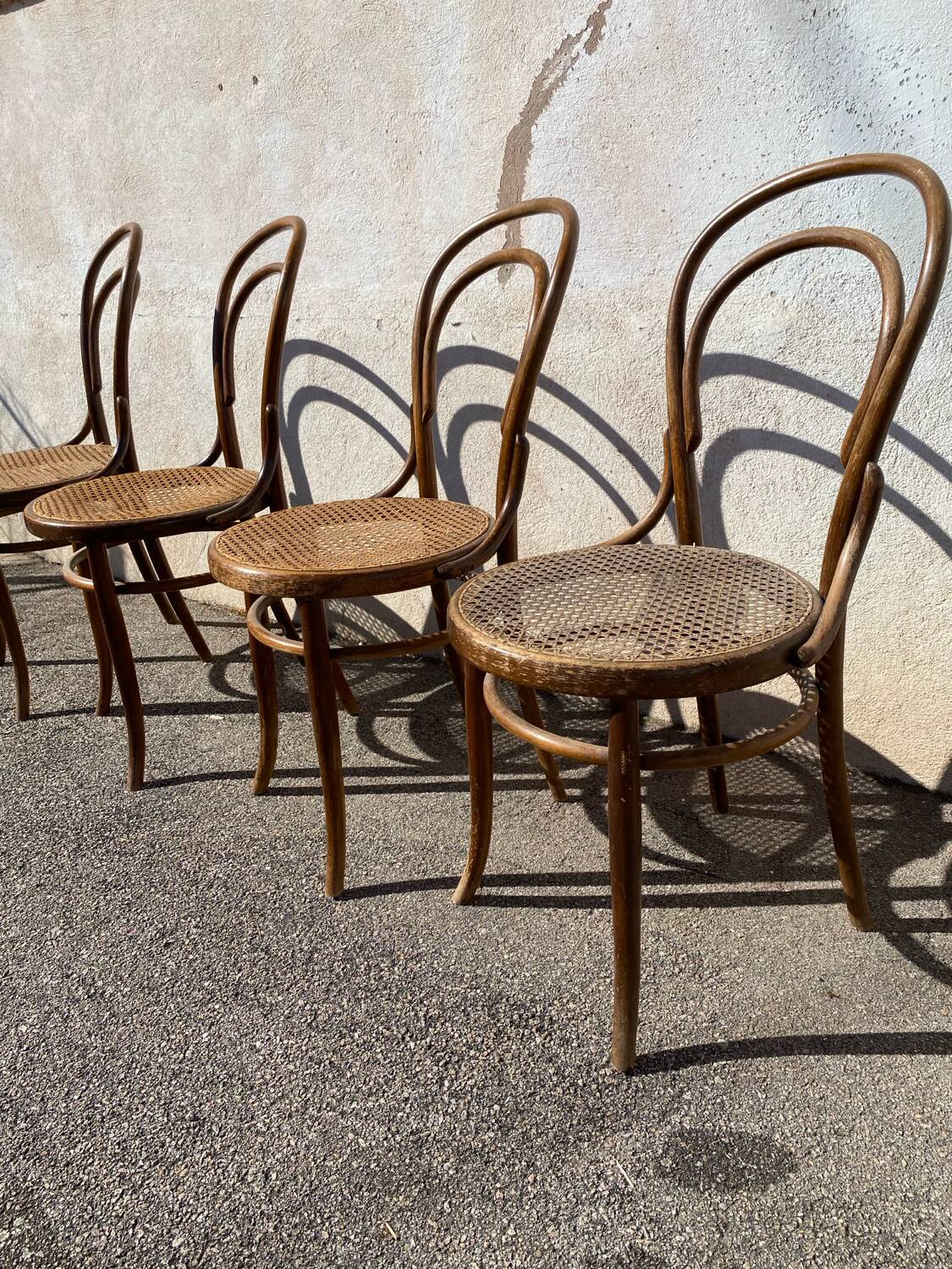 Set of 4 wooden and cane bistro chairs