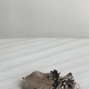 Petit vide-poche en métal argenté