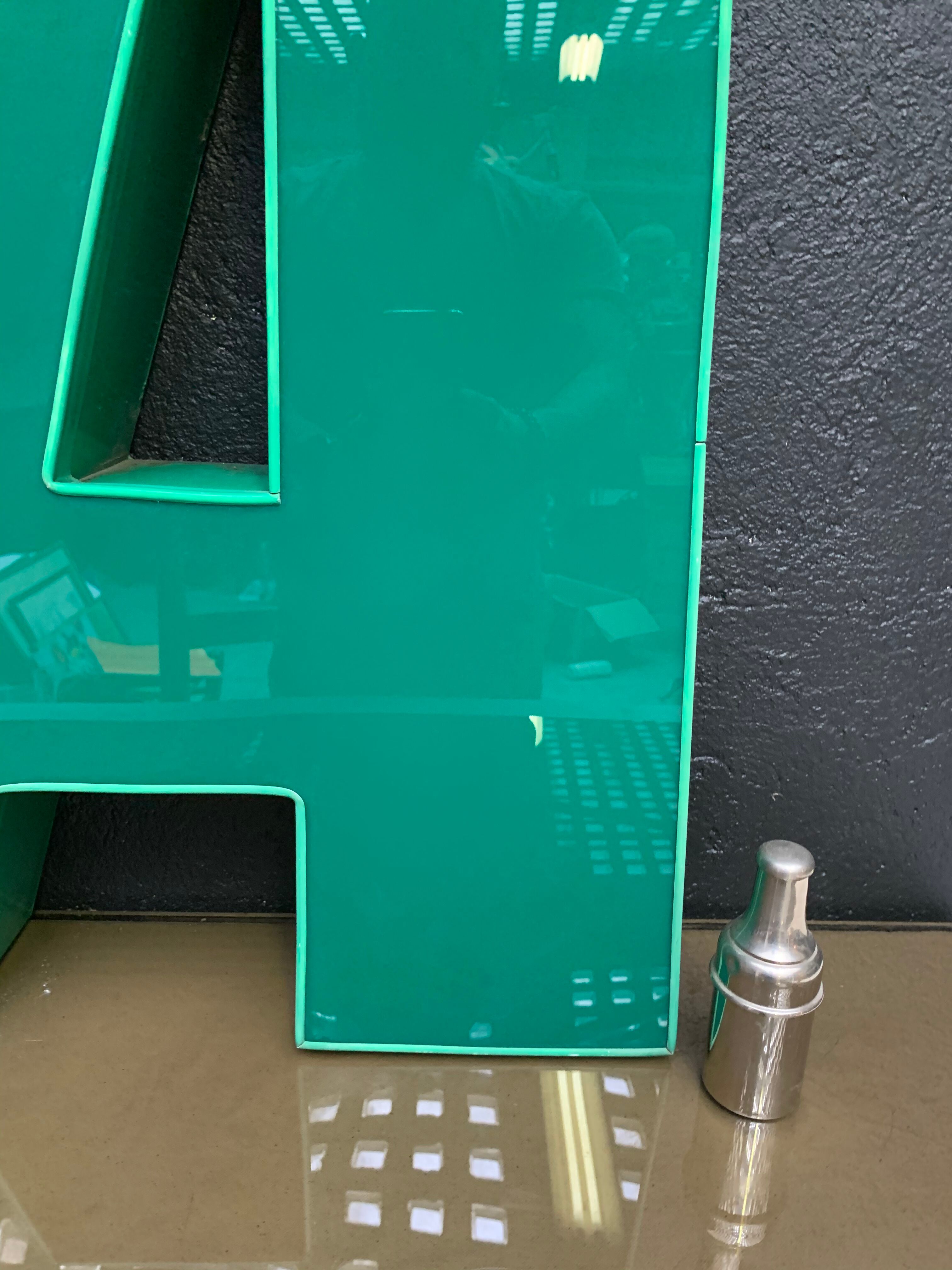 Old letter in metal and plexiglass, industrial decoration