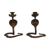Pair of old bronze cobra candle holders with detailed engraving. Around 1950