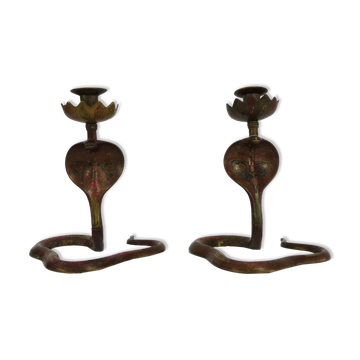 Pair of old bronze cobra candle holders with detailed engraving. Around 1950