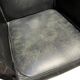 Pair of leather armchairs with marquetry armrests