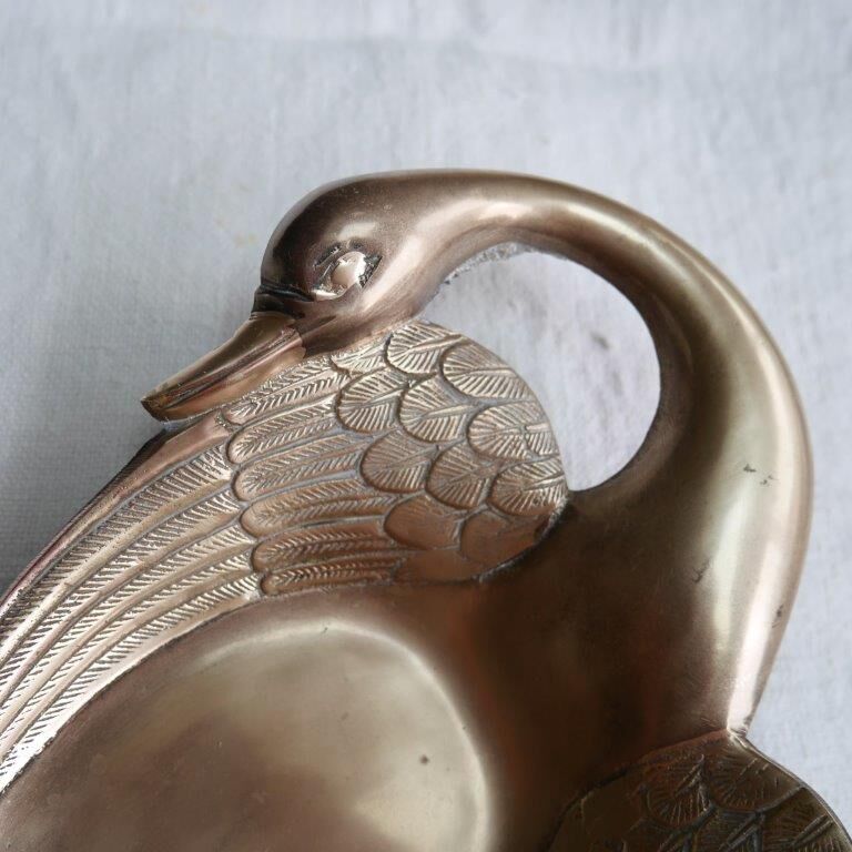 Brass swan pocket empty